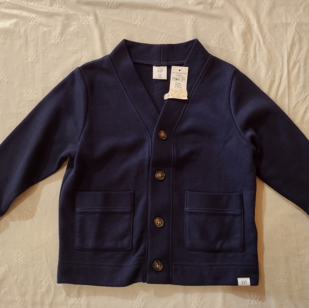 size 3, blue button up sweater.